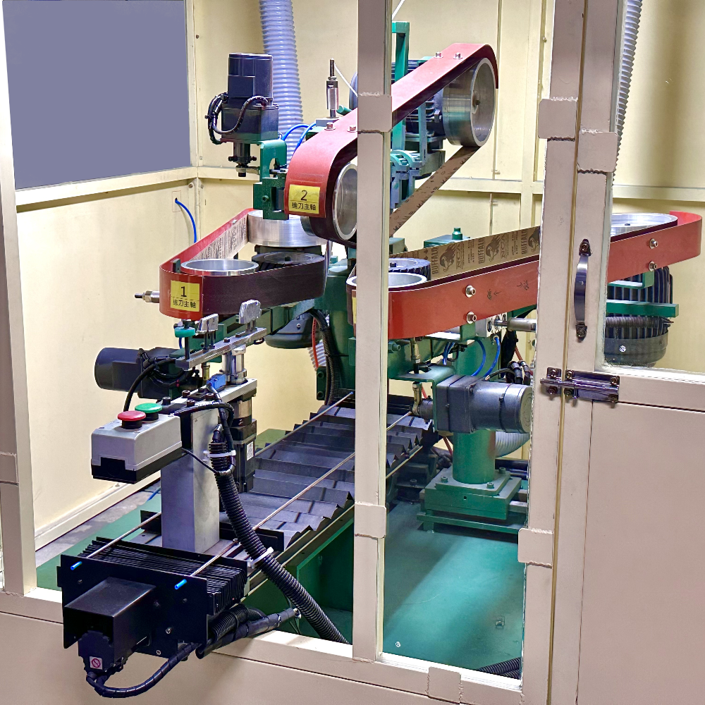 A custom-designed solution tailored to our client’s needs, this three-direction belt grinding machine enables simultaneous multi-surface processing. With a single setup, all three faces are ground efficiently, enhancing productivity, precision, and consistency in every cycle.